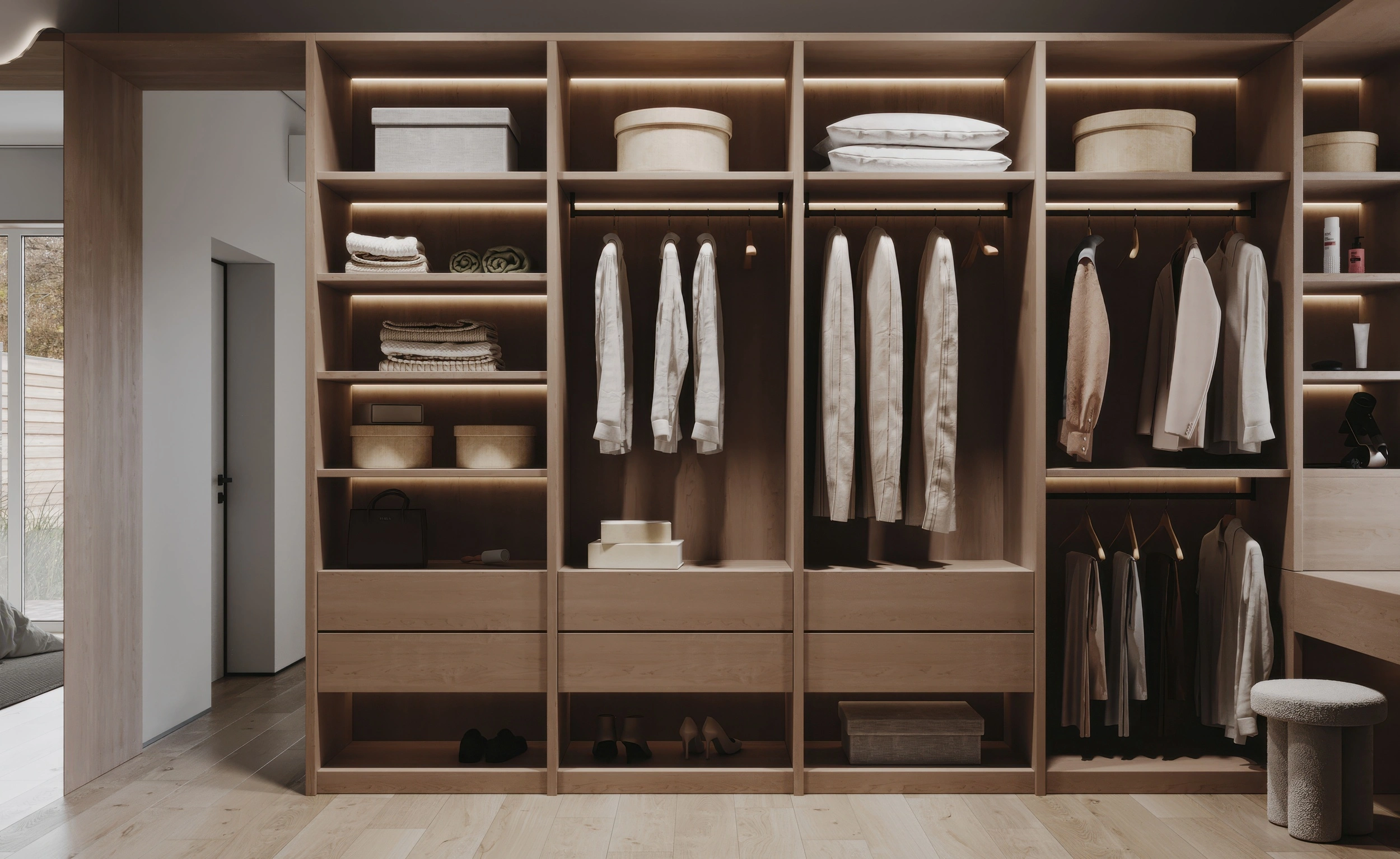 Fitted timber wardrobe interior with adjustable shelving, hanging rails and folded storage